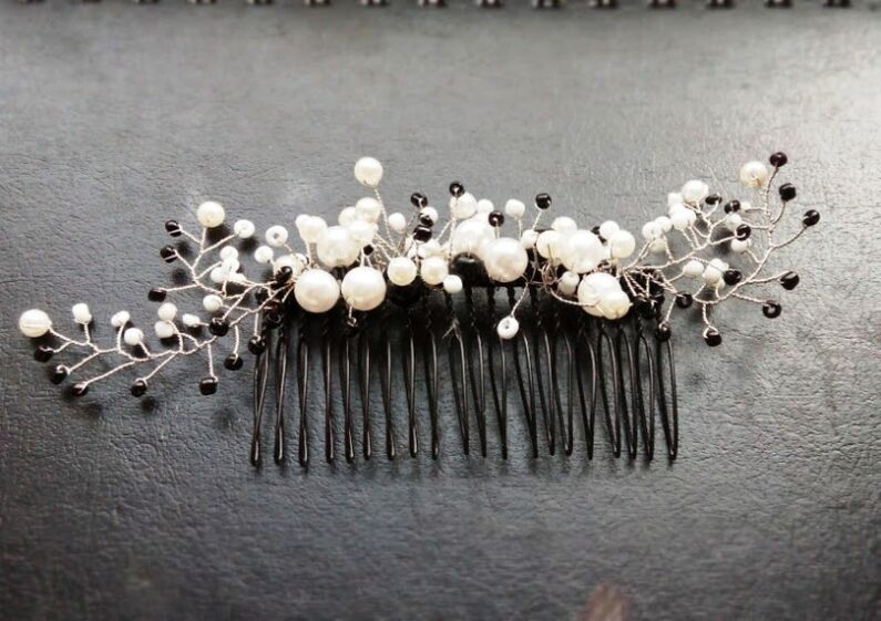 Comb with beads as good luck charm
